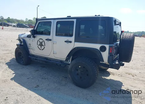 2011 Jeep Wrangler Unlimited Sport z USA, uszkodzony, nr VIN 1J4BA3H17BL517599